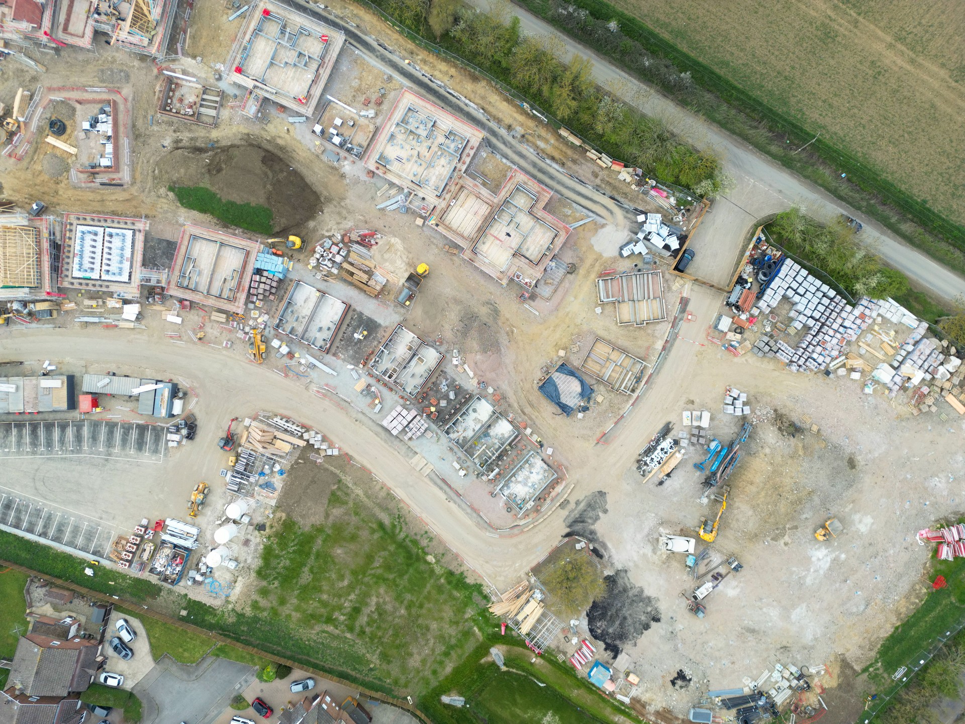 Drone top down view of a rural housing development site in rural Britain.